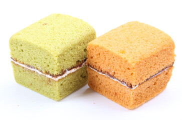 Brownie cheese cake and green tea cake on white background