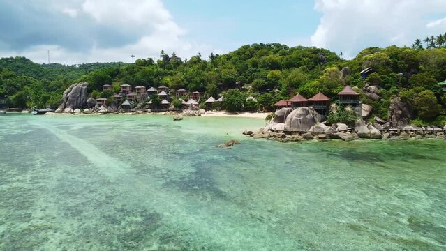 Ko Tao, Thailand: Aerial drone footage of the coastline of the idyllic Koh Tao island in the gulf of Thailand. The island is famous for its beaches and diving spots. 
