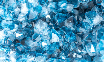 Blue Crystal Mineral Stone. Gems. Mineral crystals in the natural environment. Texture of precious and semiprecious stones. Seamless background with copy space colored shiny surface of precious stones