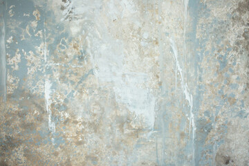 Light background of decorative plaster with abstract spots. Unusual texture of white or gray wall with beautiful patterns, creative surface background. Finishing coating for building cladding.