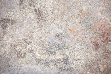 Background Stone wall background with abstract spots. Beautiful gray marble texture with stains, abstract surface background. Finishing stone for building cladding. Furniture granite.
