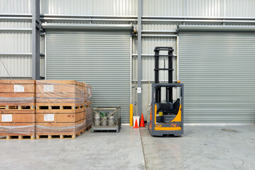 Forklift parked inside the warehouse.