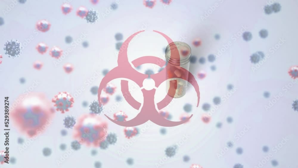 Poster animation of floating macro covid-19 cellsâ and biohazard symbol over falling box of pills