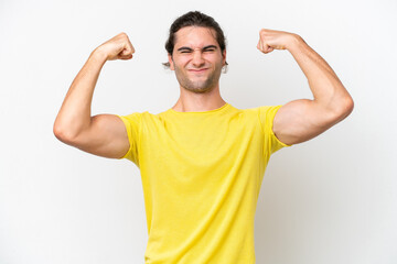 Caucasian handsome man isolated on white background doing strong gesture