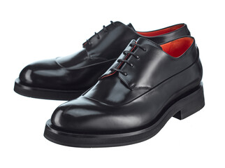 Elegant pair of men's derby shoes made of glossy black leather, lace-up, with beautiful highlights on the surface, isolated on a white background. 