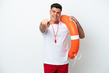 Young handsome man isolated on white background with lifeguard equipment and surprised expression...