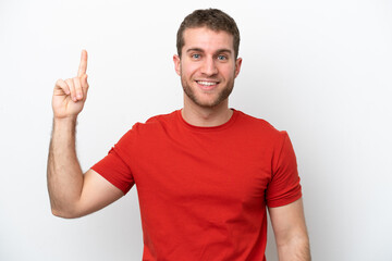 Young caucasian man isolated on white background pointing up a great idea