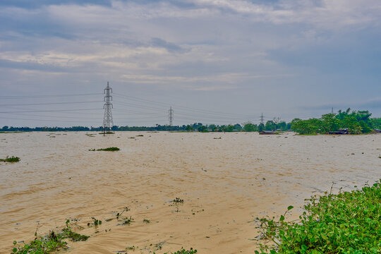 Electricity transmission towers in flood waters