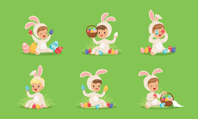 Obraz na płótnie Canvas Easter with Smiling Children in Bunny Costume Playing with Decorated Eggs Sitting on Green Garden Lawn Vector Set