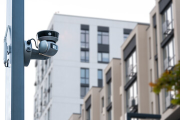 Security equipment concept - cctv camera on house pole Security system zone monitoring.