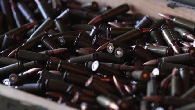 AK47 ammunition, ammo for hunting, 7.62 caliber bullet, military target, closeup shell gun ammunition, military concept, gun crime, close up ammunition, shotgun ammunition, close up military target.