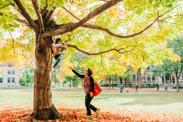 parent and child in autumn park