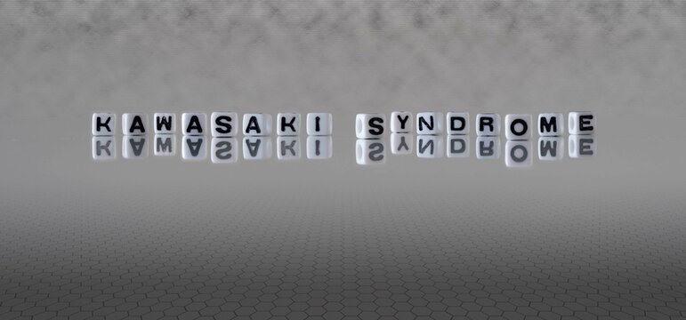 Kawasaki Syndrome Word Or Concept Represented By Black And White Letter Cubes On A Grey Horizon Background Stretching To Infinity