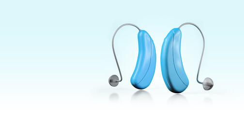Hearing aids for the deaf blue color with copy space