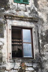 an old open window in an old house