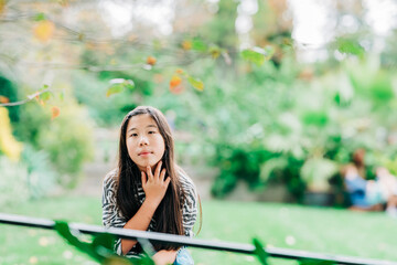 woman with computer in the park