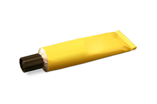 Gelbe Tube Klebstoff mit schwarzem Deckel, freigestellt auf weißem Hintergrund