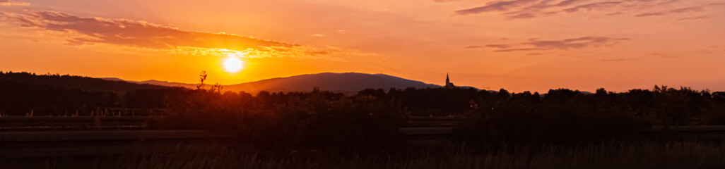 Obraz premium Beautiful sunrise view with two churches at Hengersberg, Bavaria, Germany