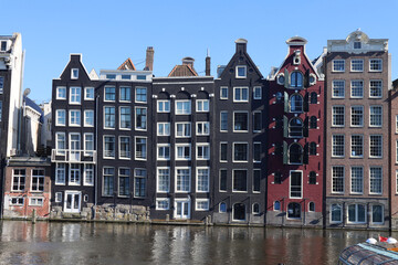 Fototapeta premium Amsterdam building structure, buildings in canal, buildings in Amsterdam