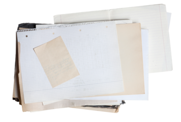 Sheet of square paper on pile of aged papers