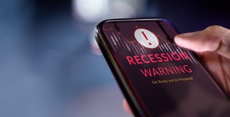 Recession, Inflation Concepts. Close-up of Mobile show Warning Alert on Screen. World Economic Crisis Impact