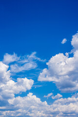 Naklejka na ściany i meble Beautiful blue sky with white clouds background useful for sky replacement