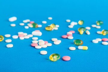 Many different colorful medication and pills perspective view. Set of many pills on colored background