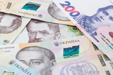 heap of  Ukrainian hrivnya banknotes
