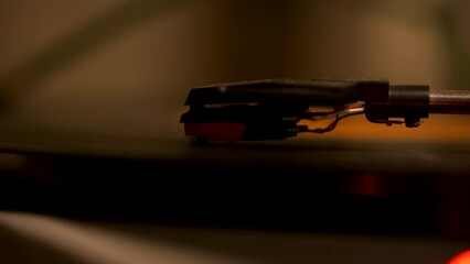 Extreme Close up of a vinyl spinning on a record player (4K)