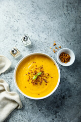Traditional pumpkin soup with crunchy onion