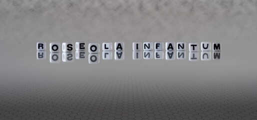 roseola infantum word or concept represented by black and white letter cubes on a grey horizon...