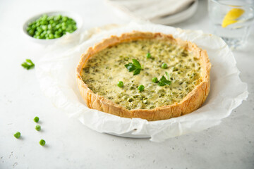 Homemade green pea quiche with cheese