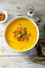 Traditional pumpkin soup with crunchy onion