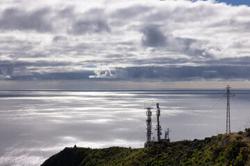 Coast La Palma, seascape with silhouette of telephone transmission towers
