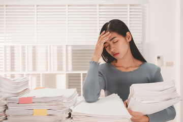 Female Employee woman hands working and searching in Stacks paper files.