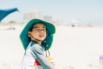 portrait of a cute boy playing at the ebach