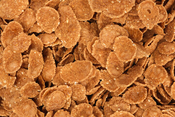 Durum wheat flakes, quick breakfast, top view, close-up.