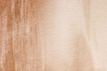 Abstract art background light brown and beige colors. Watercolor painting with soft bronze gradient.