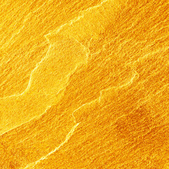 Gold stone texture for background. gold background