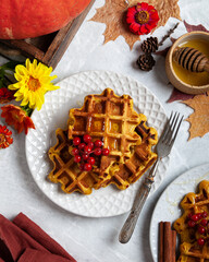 pumpkin waffles on a bright autumn table. autumn, halloween, holidays, holiday, halloween food, healthy food, organic food, farm products, autumn menu, concept.