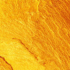 Gold stone texture for background.