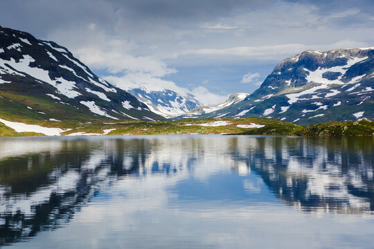 Norway mountain lake reflection