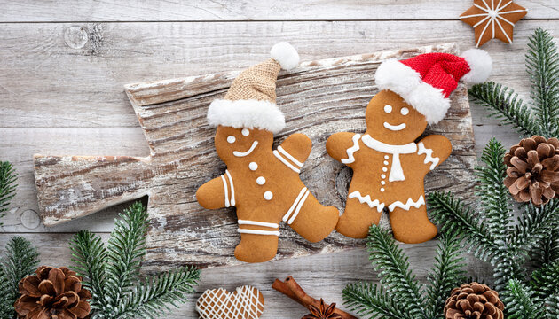 Homemade christmas gingerbread cookies on wooden table.