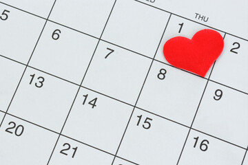Red heart shape on the date of the 1st day in the calendar.