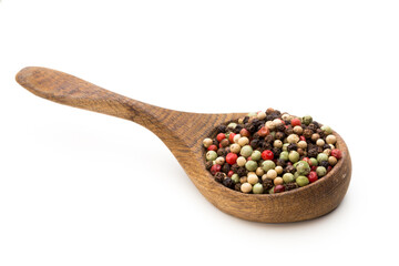 Pepper mix seed on spoon on white background.