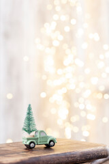 Christmas tree on bohek wooden, bokeh background.