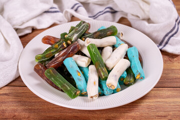 Turkish delight varieties. Traditional Turkish delicacies. Turkish delights with wick on wood floor.