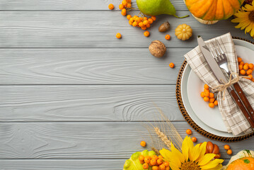 Thanksgiving day concept. Top view photo of table setting plate knife fork napkin sunflowers...