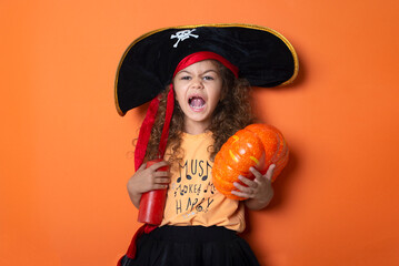 Little girl  wearing pirate costume at Halloween