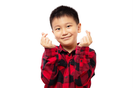 Happy kid showing mini heart hand sign, wearing red shirt - Powered by Adobe